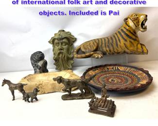 Lot 1164 This collection features a variety of international folk art and decorative objects. Included is Pai