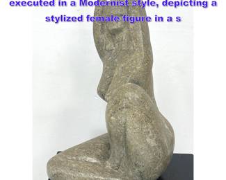 Lot 689 Handcarved stone sculpture executed in a Modernist style, depicting a stylized female figure in a s
