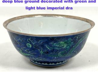 Lot 1008 Chinese porcelain bowl featuring a deep blue ground decorated with green and light blue imperial dra