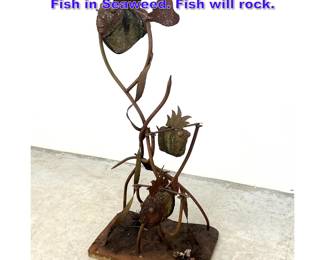 Lot 878 Iron and Stone Garden Sculpture of Fish in Seaweed. Fish will rock. 