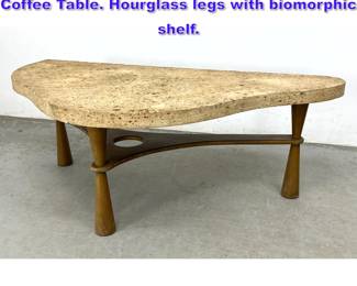 Lot 604 Dunbar Style Thick Travertine Top Coffee Table. Hourglass legs with biomorphic shelf. 