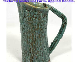 Lot 1020 Ceramic Faux Bois Pitcher. Glazed textured Modernist Form. Applied Handle. 
