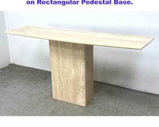 Lot 743 Marble console table. Travertine top on Rectangular Pedestal Base. 