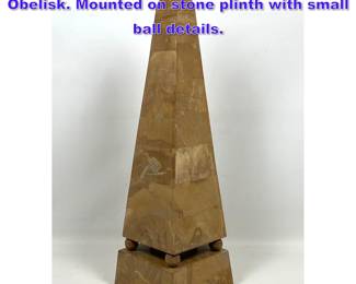 Lot 734 Large Pieced Stone Decorative Obelisk. Mounted on stone plinth with small ball details. 