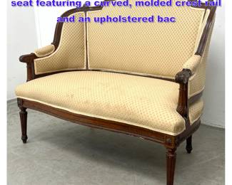 Lot 1131 Louis XVI style walnut settee love seat featuring a curved, molded crest rail and an upholstered bac