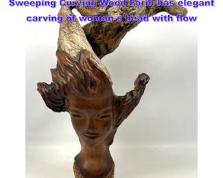 Lot 766 Carved Driftwood Sculpture. Sweeping Curving Wood Form has elegant carving of woman s head with flow