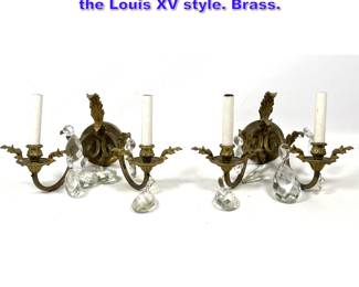 Lot 1142 Pair of twolight wall sconces in the Louis XV style. Brass. 
