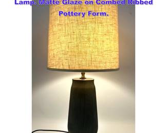 Lot 648 Mid Century Modern Glazed Pottery Lamp. Matte Glaze on Combed Ribbed Pottery Form. 