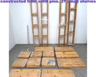 Lot 881 IKEA IVAR modular shelving system constructed from solid pine. 31 small shelves 