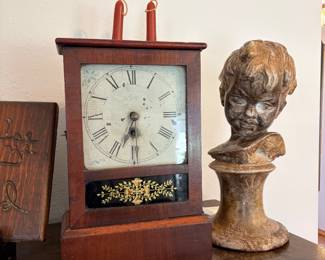 Antique clock and statue