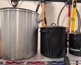 Stainless steel boiling pot, an enamel stock pot and an enamel vegetable steamer pot