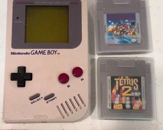 Vintage Nintendo Game Boy and two games