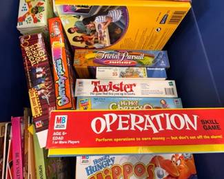 Tub of assorted family board games