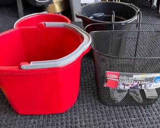 Plastic wash buckets and a handled mesh basket