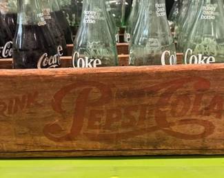 Vintage Pepsi-Cola crate and Coca-Cola bottles