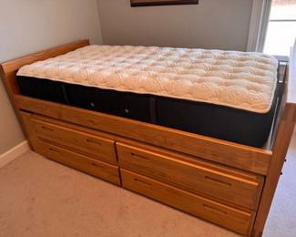 This End Up captain's bed with storage and a new Stearns & Foster Estate twin mattress