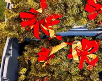 Tubs of Christmas garland and ribbons