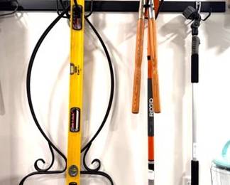 Yard and garden tools and an iron folding plant stand