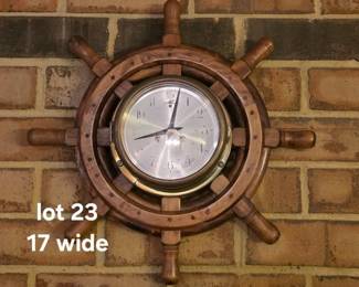 Ship's clock mounted in ship's wheel