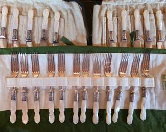Mother of pearl forks and knives, made in England