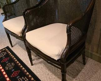 Pair of cane faux bamboo chairs with cushions