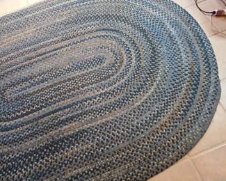 Oval blue braided rug