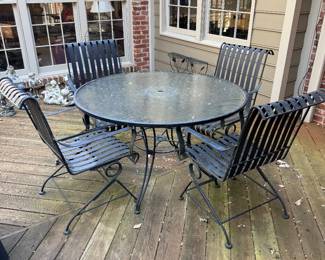 Wrought Iron Glass Table and 4 Chair Set-$250- 48 inches wide