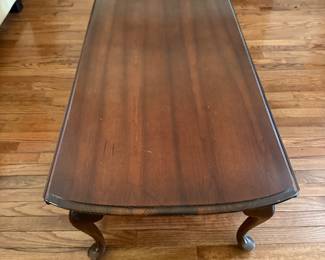 Cherry Drop Leaf Table - $125- 54 inches long, 24 wide, 17 tall