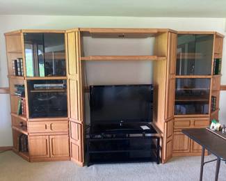 Entertainment center in 3 pieces. Quality, sturdy furniture with great storage capabilities.
