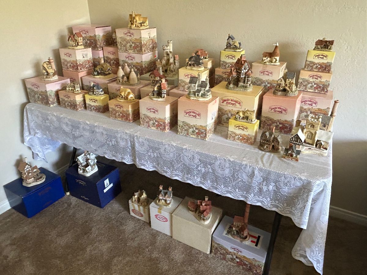 Dozens of boxed David Winter Cottages. Perfect for collecting, gifting or reselling.