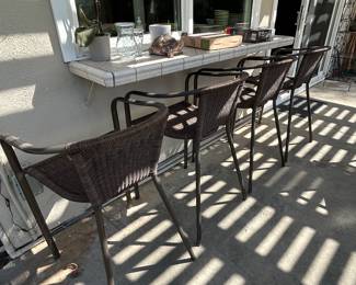 Rattan barstools.