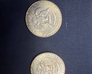 Two John F. Kennedy Half Dollar Coins - One with Damage/Alteration