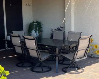7-pc Patio Set (6-Swivel Sunbrella sling chairs) Table approx. 82" x 44"