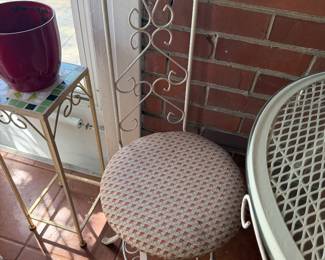 One of four dainty Patio chairs