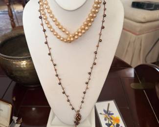 Faux and authentic pearl necklaces