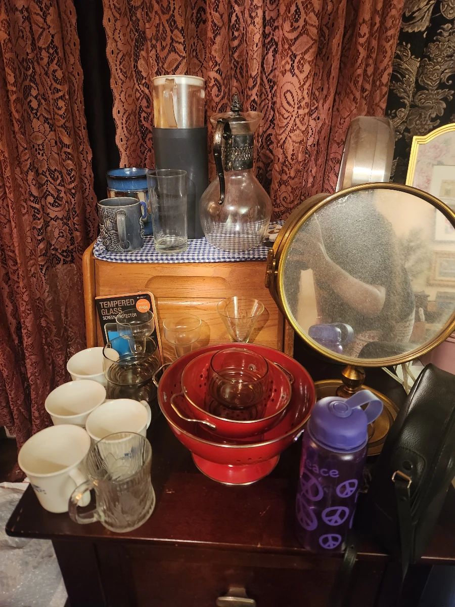 glassware, face mirrors, pasta strainers, bread box