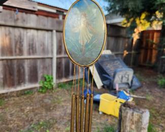 windshield with picture of fairy riding a dragonfly, mop & bucket, mobility scooter