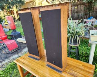 speakers, standing punching bag, folding lawnchair