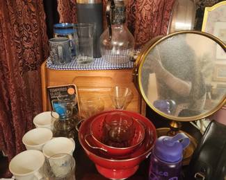 glassware, face mirrors, pasta strainers, bread box