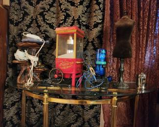 glass table, popcorn machine, electric microscope, heating face mask, blow dryer