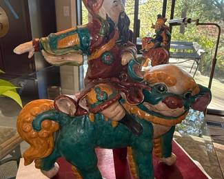 Chinese Polychrome Ceramic Figure of a Warrior Riding a Foo Dog