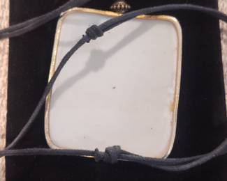 Antique Porcelain Cameo Pendant with Gold Tone Setting and Cord