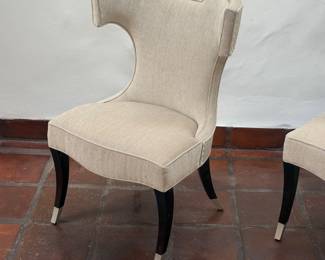 Armchair Klismos-Inspired Dining Chair in Cream Upholstery with Lucite Handle, Wood legs and Brass Feet by Caracole Cosmopolitan, a Pair  38”H x 27.5W x 23”D