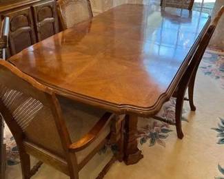 70 inch long with one leaf, each leaf is 11.5 inches; 13 inches tall 40 inches wide - chairs are 39 inches tall. does come with table cover in separate box.