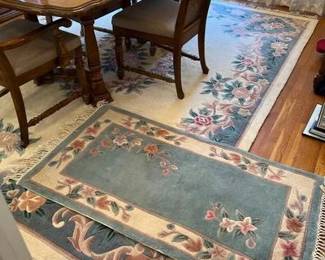 Set Of Two Area Rugs, One Large, One Smaller Large larger rug is 10 1/2‘ x 8‘ smaller rug is 54“ x 29“ smoke free pet free