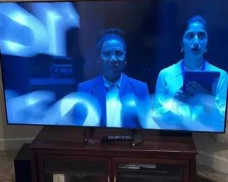 65 Inch Samsung Tv Remote And Tv Stand TV stand 40 inches long along with working TV 65 inches and remote no additional speakers cable boxes, etc. included