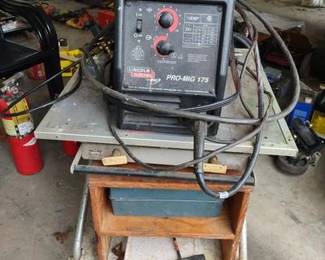 Lincoln Electric Pro-MIG 175 welder With Cart. The item in the image is a Lincoln Electric Pro-MIG 175 welder, which is designed for various welding applications.