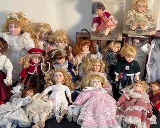 Large Lot Of Over 20 Porcelain Dolls Beautiful grouping of porcelain dolls and friends