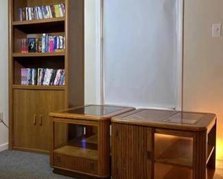 2 Solid wood generously sized end tables, with storage. Bookcase with hidden storage below and 3 open shelves on top (items on bookshelf are NOT included). End table dimensions (26.5w/26.5d/34h) bookcase dimensions 30w/13d72h)