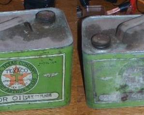 Vintage oil cans; immediately after Texaco's purchase of Indian Refining Co. and Halvoline